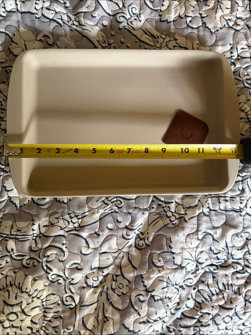 Pampered Chef Beige Rectangular Bake Pan with Brown Silicone Tool